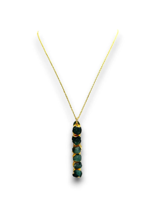Necklace with a green stone pendant on a white background