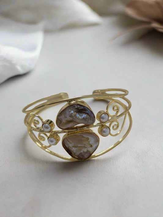 Gold bracelet with stones