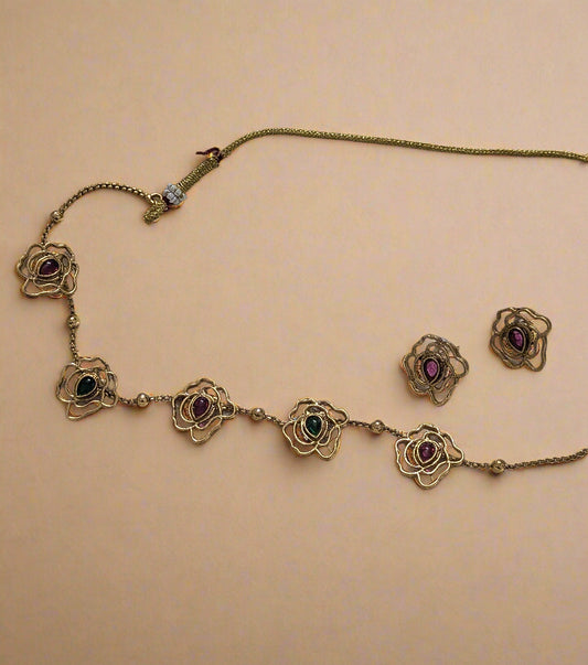Gold necklace with gemstones