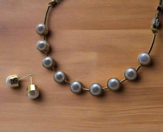 Pearl necklace and earrings